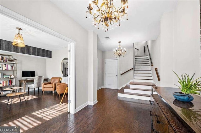 foyer entrance with dark wood-style flooring, visible vents, stairway, a chandelier, and baseboards