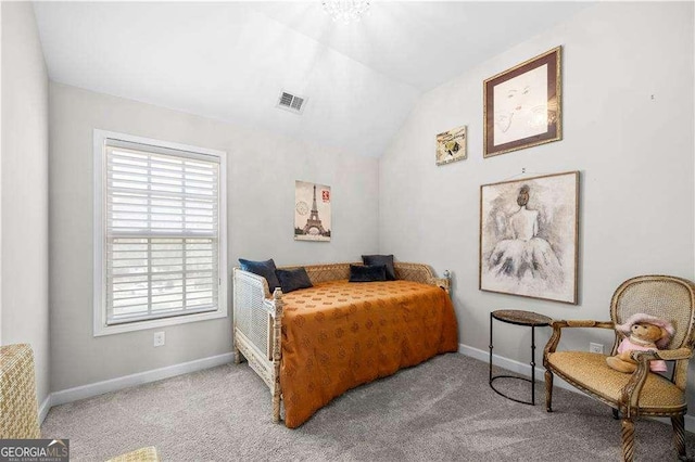 bedroom featuring light carpet, baseboards, visible vents, and vaulted ceiling