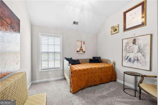 bedroom with lofted ceiling, visible vents, light carpet, and baseboards