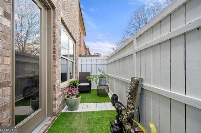 view of yard featuring a fenced backyard