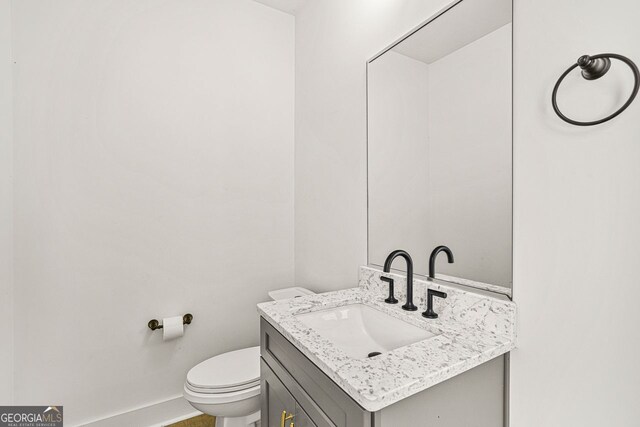 244 Locust St Unit B, Atlanta, GA 30317 - half bath with vanity, toilet, and baseboards