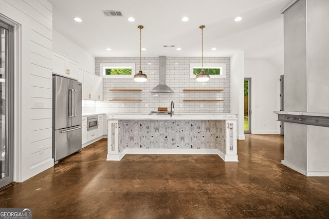244 Locust St Unit B, Atlanta, GA 30317 - kitchen with stainless steel appliances, open shelves, wall chimney range hood, concrete floors, and light countertops
