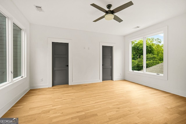 244 Locust St Unit B, Atlanta, GA 30317 - unfurnished bedroom featuring baseboards, light wood-style floors, and ceiling fan