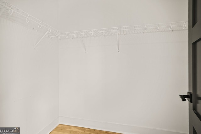 244 Locust St Unit B, Atlanta, GA 30317 - walk in closet featuring light wood finished floors