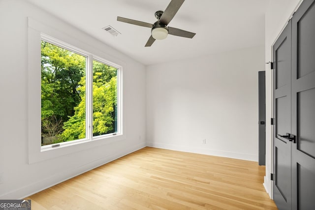 244 Locust St Unit B, Atlanta, GA 30317 - spare room with a ceiling fan, light wood-style flooring, and baseboards