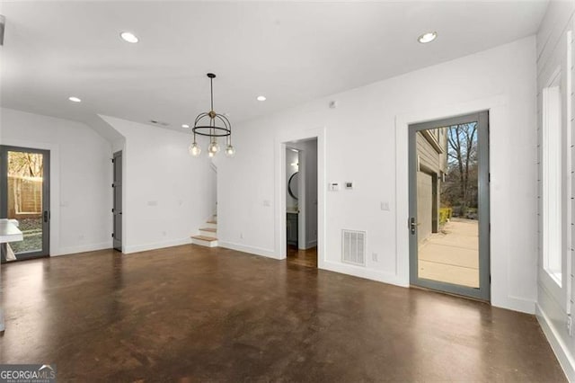 unfurnished dining area with recessed lighting, visible vents, and concrete floors