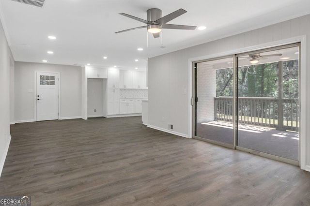 unfurnished living room featuring recessed lighting, baseboards, a ceiling fan, and dark wood-style flooring