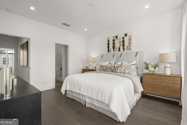 bedroom featuring connected bathroom, recessed lighting, visible vents, and dark wood finished floors