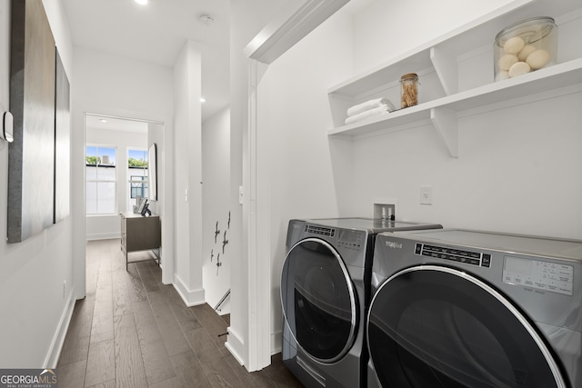 washroom with dark wood-style flooring, washer and clothes dryer, recessed lighting, laundry area, and baseboards