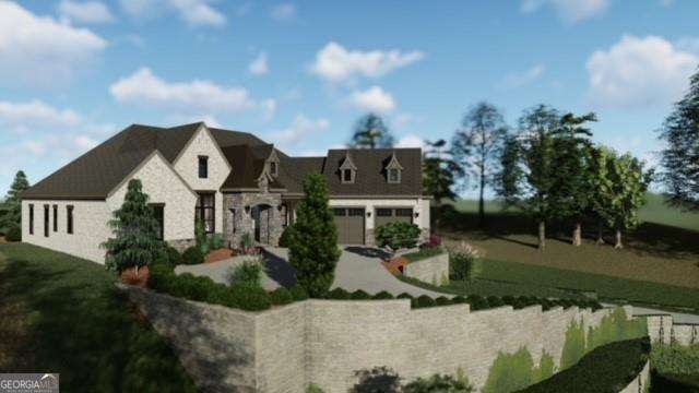 view of front facade with stone siding and a front yard