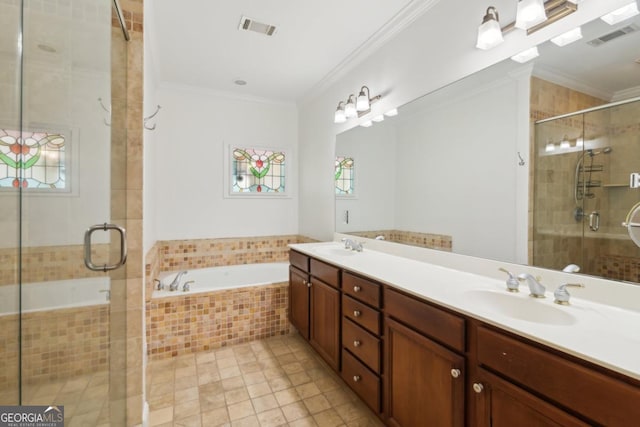 bathroom with a sink, visible vents, a bath, a stall shower, and crown molding