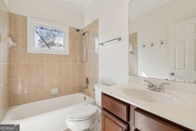 full bath featuring toilet, bathing tub / shower combination, crown molding, and vanity