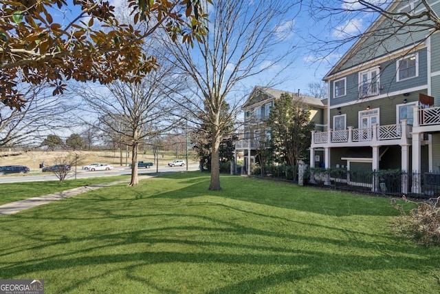 surrounding community featuring a lawn