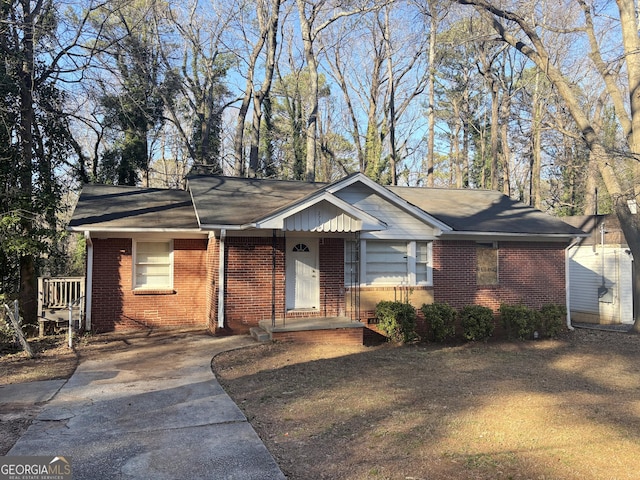 single story home with brick siding