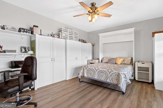 bedroom featuring ceiling fan and wood finished floors