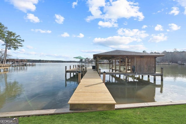 view of dock with a water view and boat lift