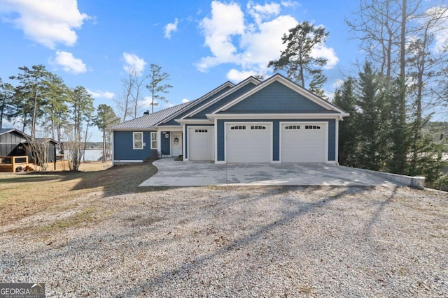 view of front of home featuring driveway and an attached garage