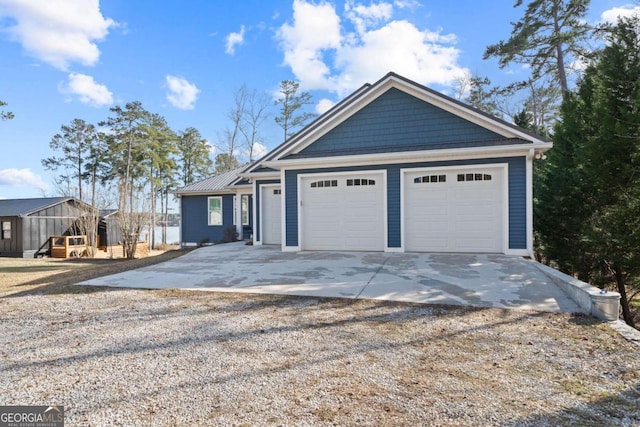 view of front of home with concrete driveway