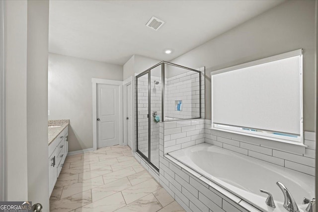 bathroom featuring visible vents, a shower stall, marble finish floor, and a garden tub