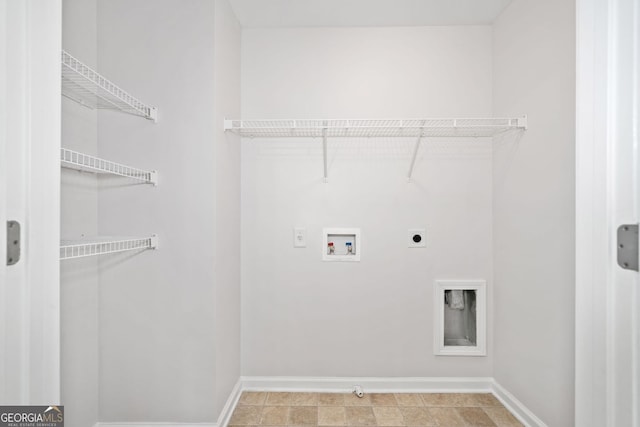 washroom with laundry area, baseboards, washer hookup, and electric dryer hookup