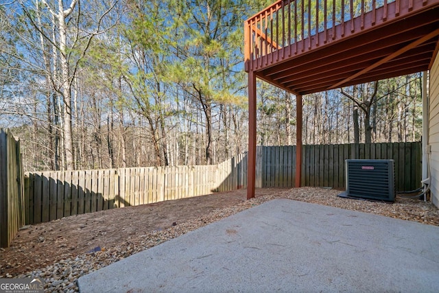 view of patio / terrace with central AC unit and a fenced backyard