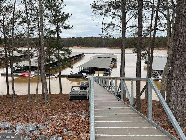 view of dock with a water view