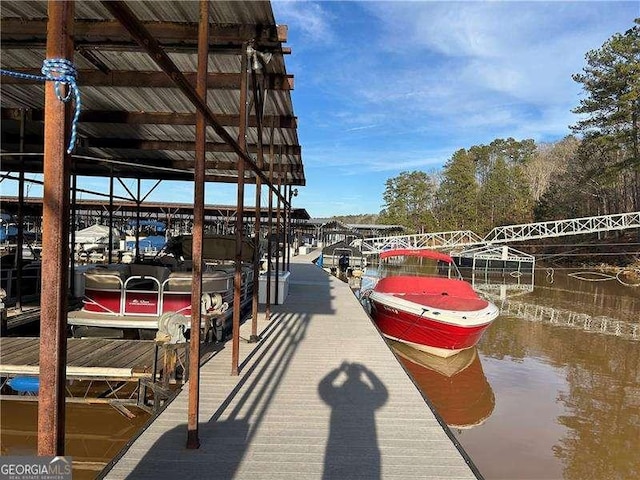 dock area featuring a water view