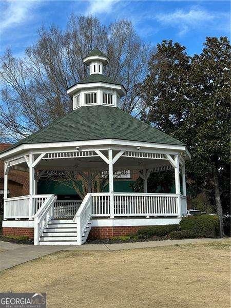 view of property's community featuring a gazebo and a yard