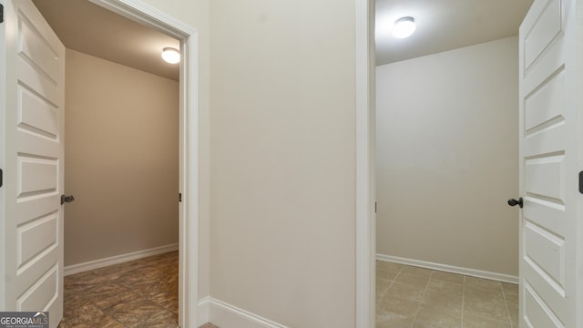 bathroom featuring baseboards