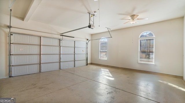 garage with baseboards and a garage door opener