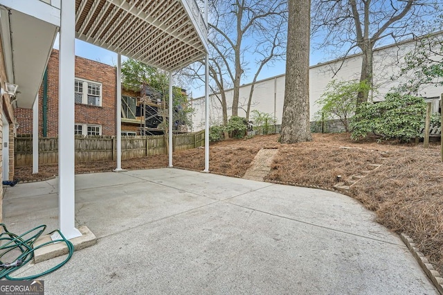 397 4th St NE, Atlanta, GA 30308 - fenced backyard featuring a patio area