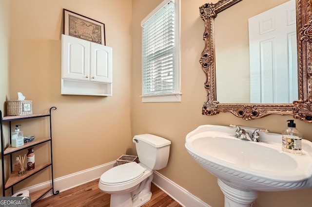 397 4th St NE, Atlanta, GA 30308 - half bathroom with baseboards and wood finished floors
