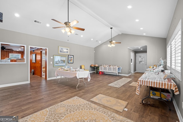 recreation room featuring baseboards, visible vents, and dark wood finished floors