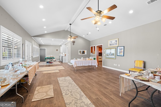 bedroom featuring lofted ceiling, recessed lighting, visible vents, wood finished floors, and baseboards