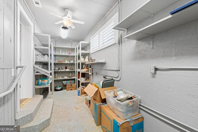 storage featuring ceiling fan and visible vents