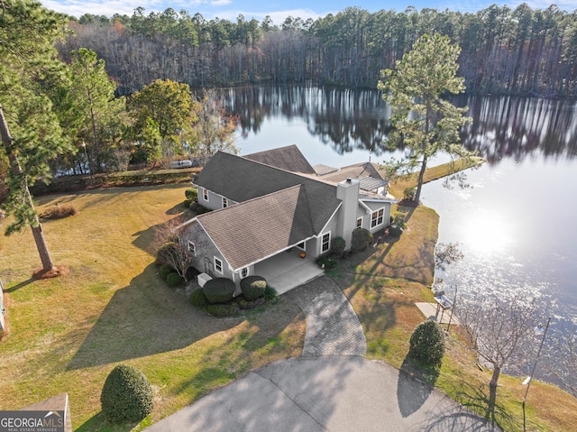 bird's eye view featuring a water view and a view of trees