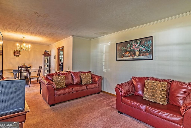 carpeted living area featuring baseboards, a chandelier, a textured ceiling, and ornamental molding