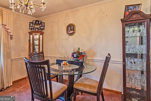 dining space featuring carpet, a notable chandelier, crown molding, and baseboards