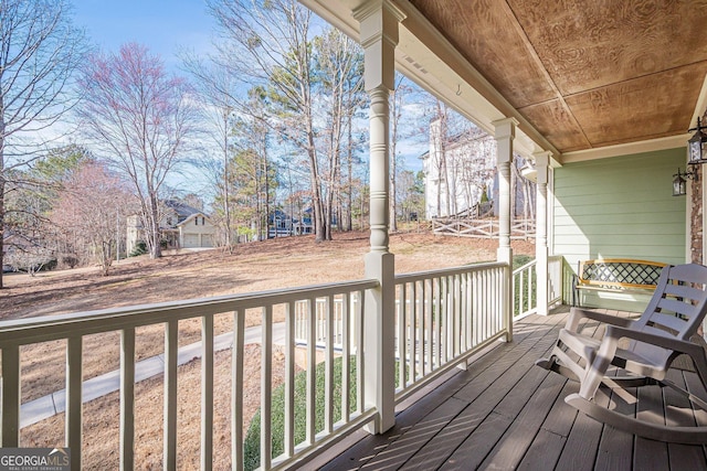 wooden terrace with covered porch