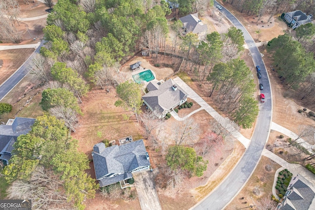 aerial overview of property's location with a pool area