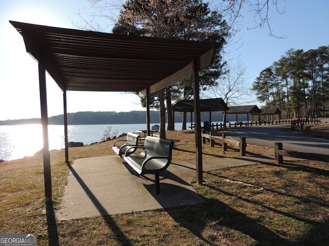 view of community featuring a gazebo and a water view