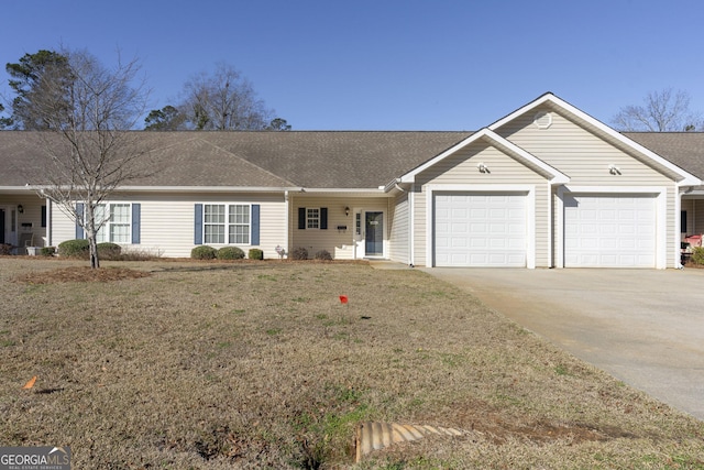 single story home with a garage, concrete driveway, and a front yard