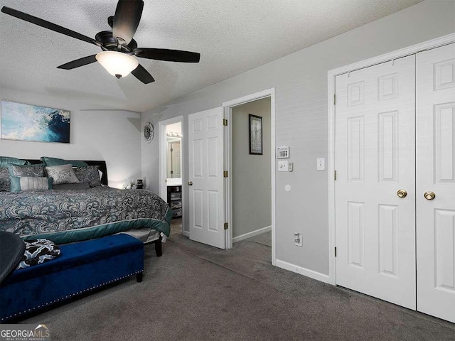 bedroom featuring a ceiling fan, baseboards, dark carpet, and a textured ceiling