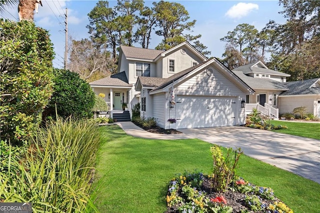 view of front of house with driveway, a front lawn, and an attached garage