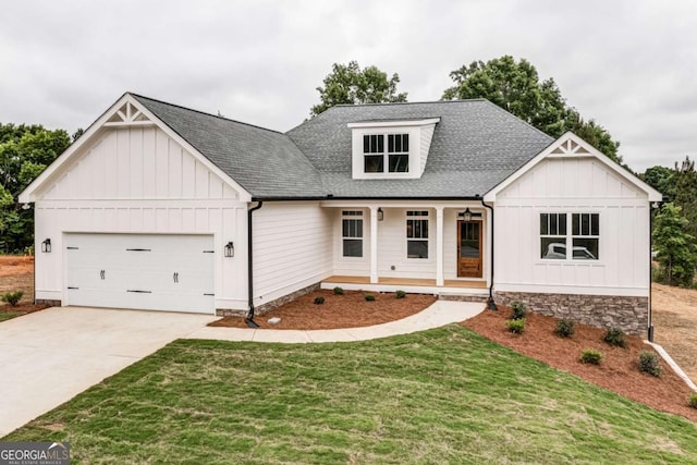 modern farmhouse style home featuring covered porch, roof with shingles, board and batten siding, and an attached garage