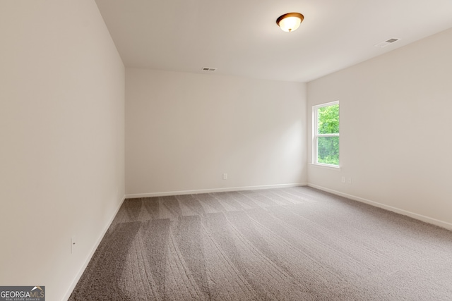 141 Roxeywood Way, Winder, GA 30680 - unfurnished room with baseboards and carpet floors