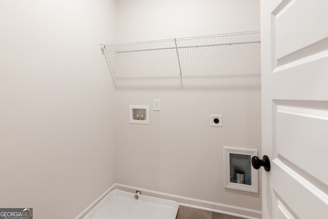 141 Roxeywood Way, Winder, GA 30680 - laundry area featuring electric dryer hookup, hookup for a washing machine, gas dryer hookup, and baseboards