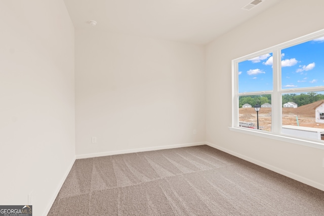 141 Roxeywood Way, Winder, GA 30680 - empty room featuring carpet floors and baseboards