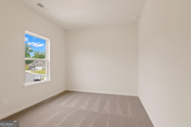 141 Roxeywood Way, Winder, GA 30680 - carpeted spare room featuring baseboards and a smoke detector