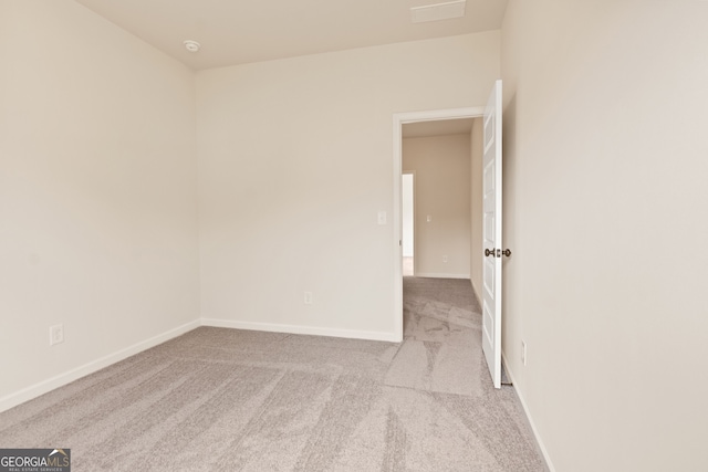 141 Roxeywood Way, Winder, GA 30680 - carpeted spare room with baseboards and a smoke detector